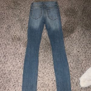 Ripped light jeans , size 0 , worn twice ,